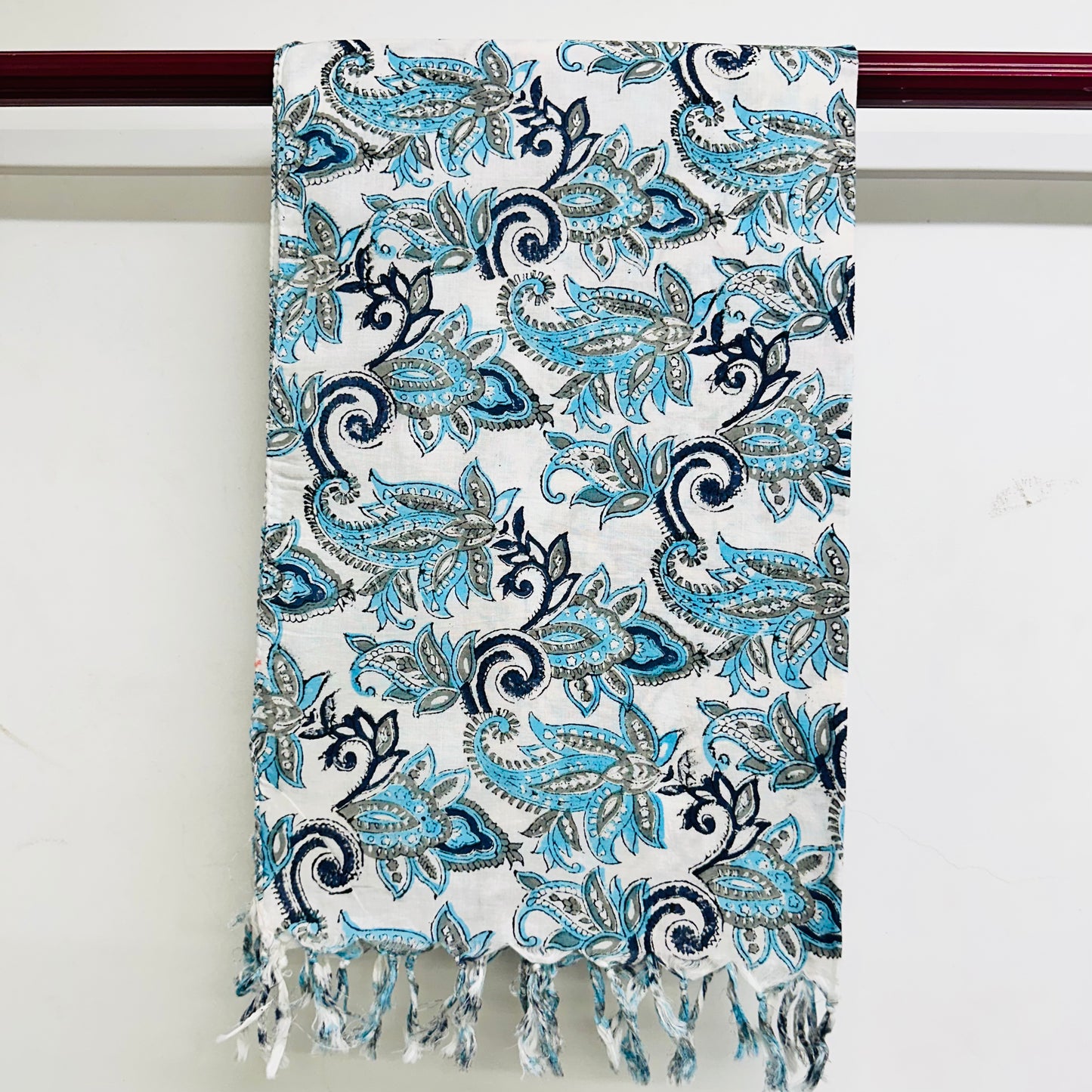 Paisley patterned scarf with blue and black design