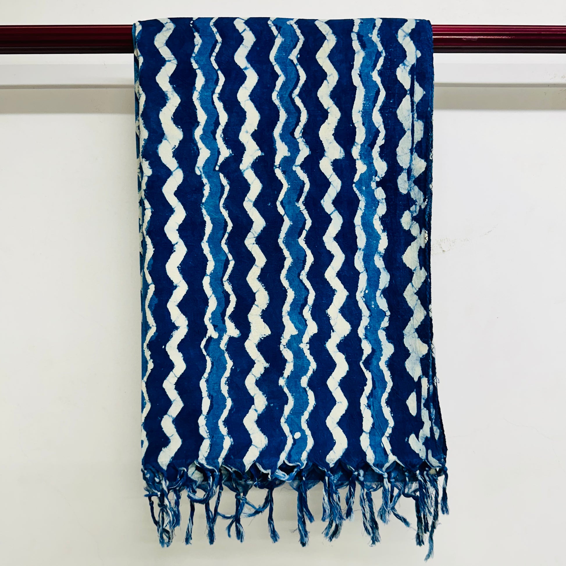 Blue and white patterned scarf