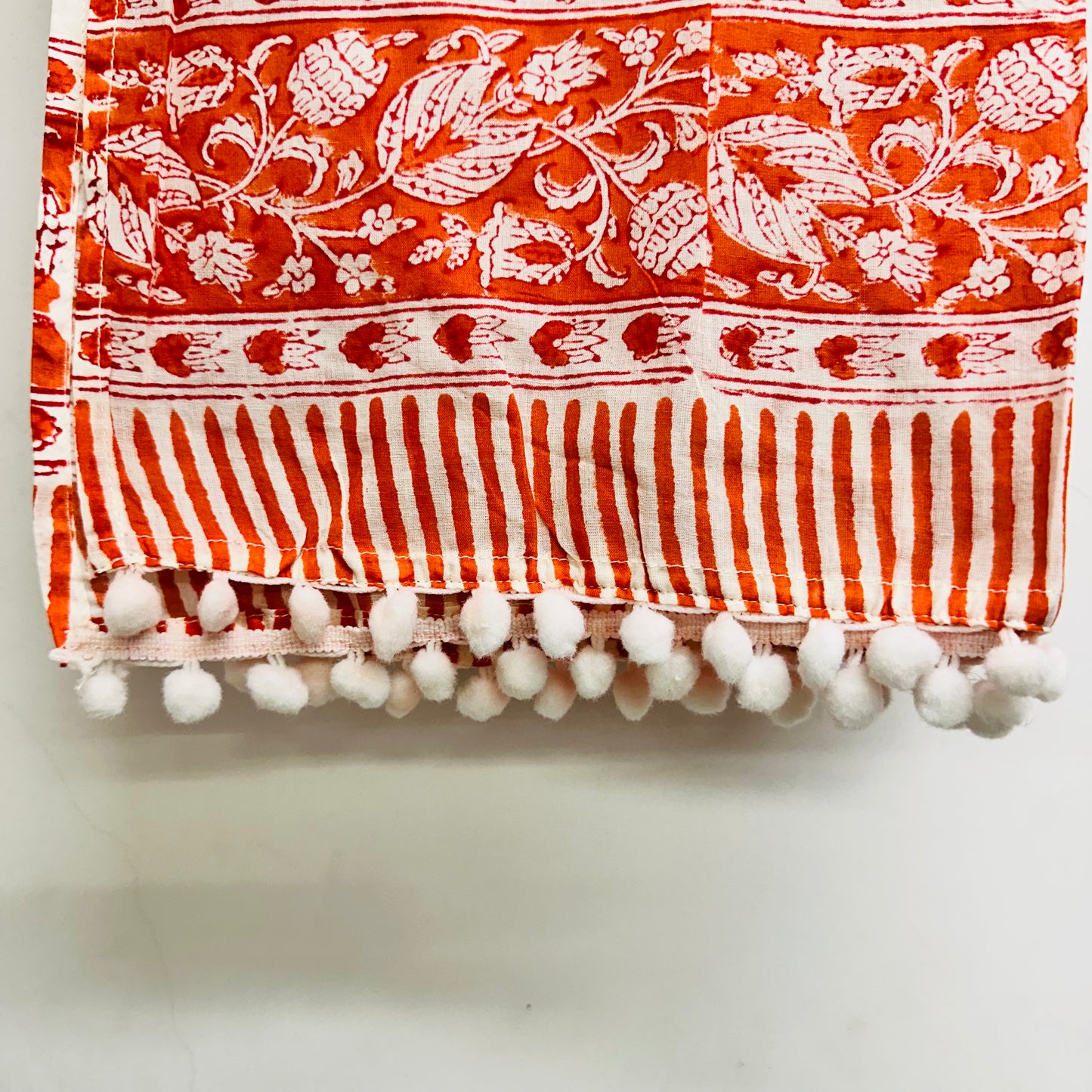 Orange Cotton scarf with white floral and striped patterns