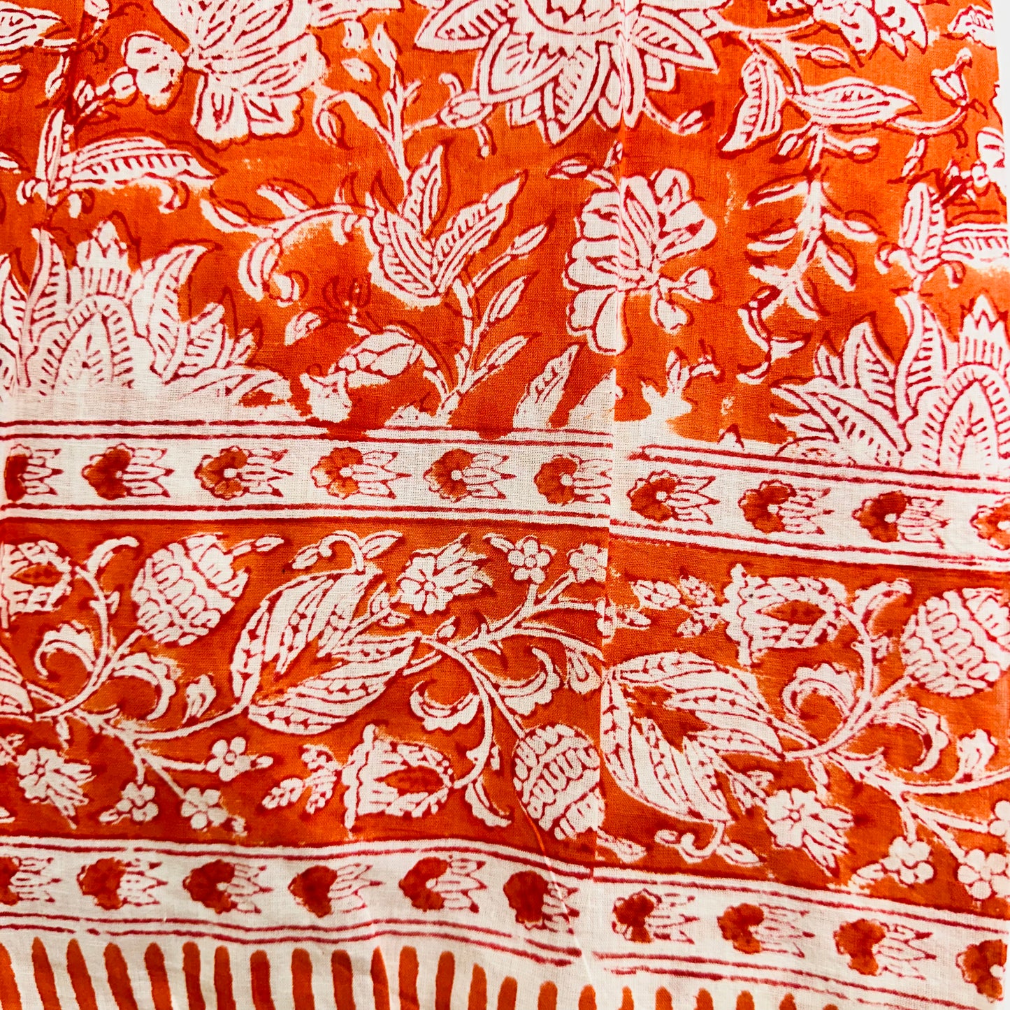 Orange Cotton scarf with white floral and striped patterns
