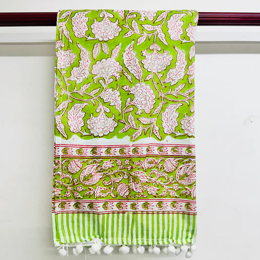 Green and white patterned Scarf with pom-pom trim