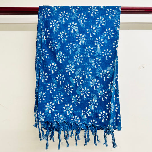 Blue floral patterned scarf with white flowers