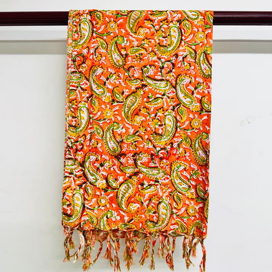 Colorful patterned scarf with green and orange design 