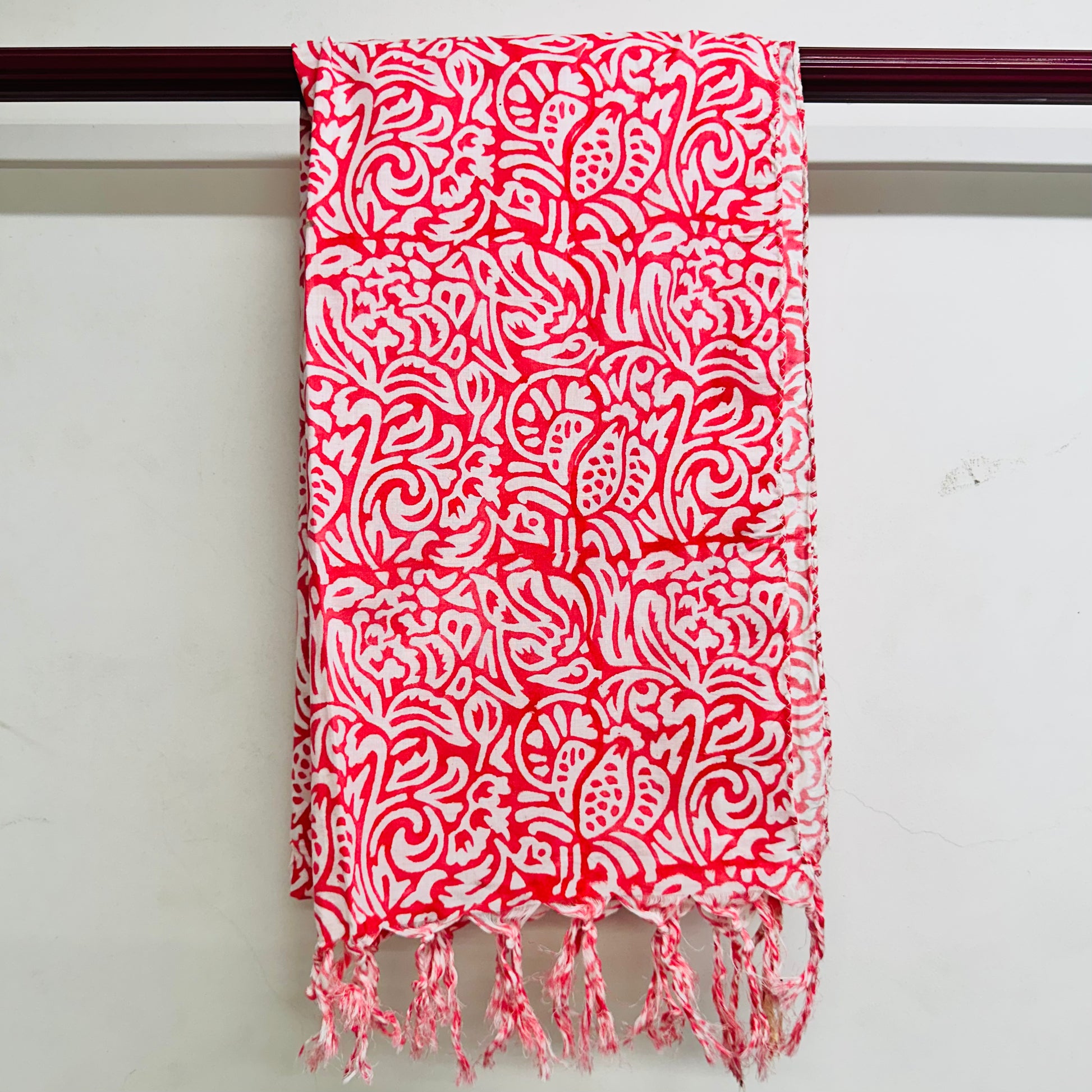 Red and white patterned scarf 