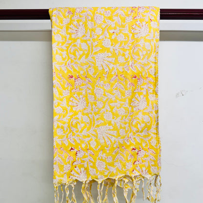 Yellow floral patterned scarf with white flowers