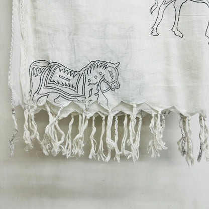 White Cotton scarf with black horse patterns and fringes on a whit