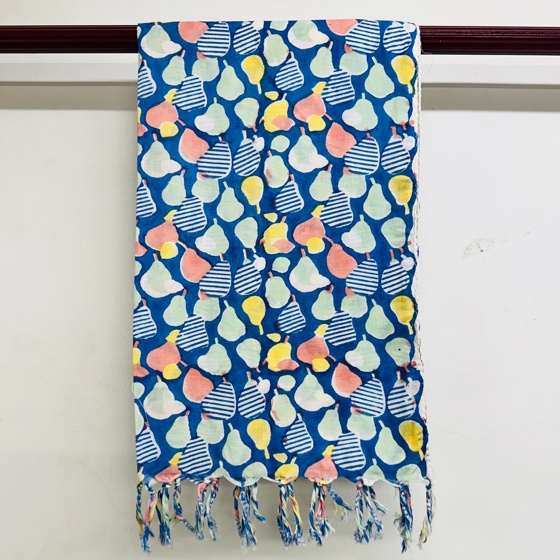 Colorful patterned scarf with tassels