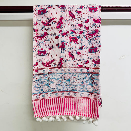 Decorative scarf with colorful patterns and pom-pom trim