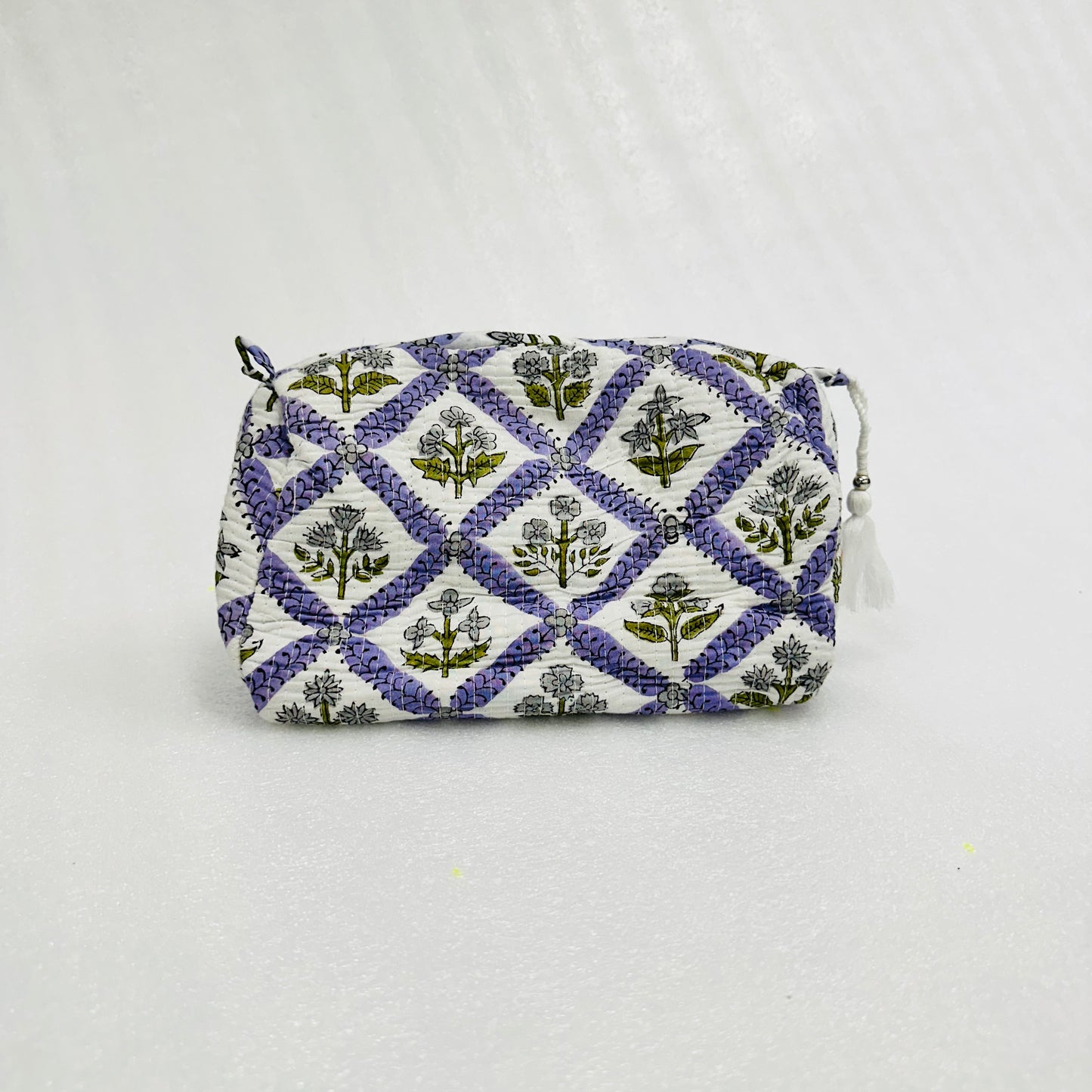 Small pouch with floral pattern on a white background