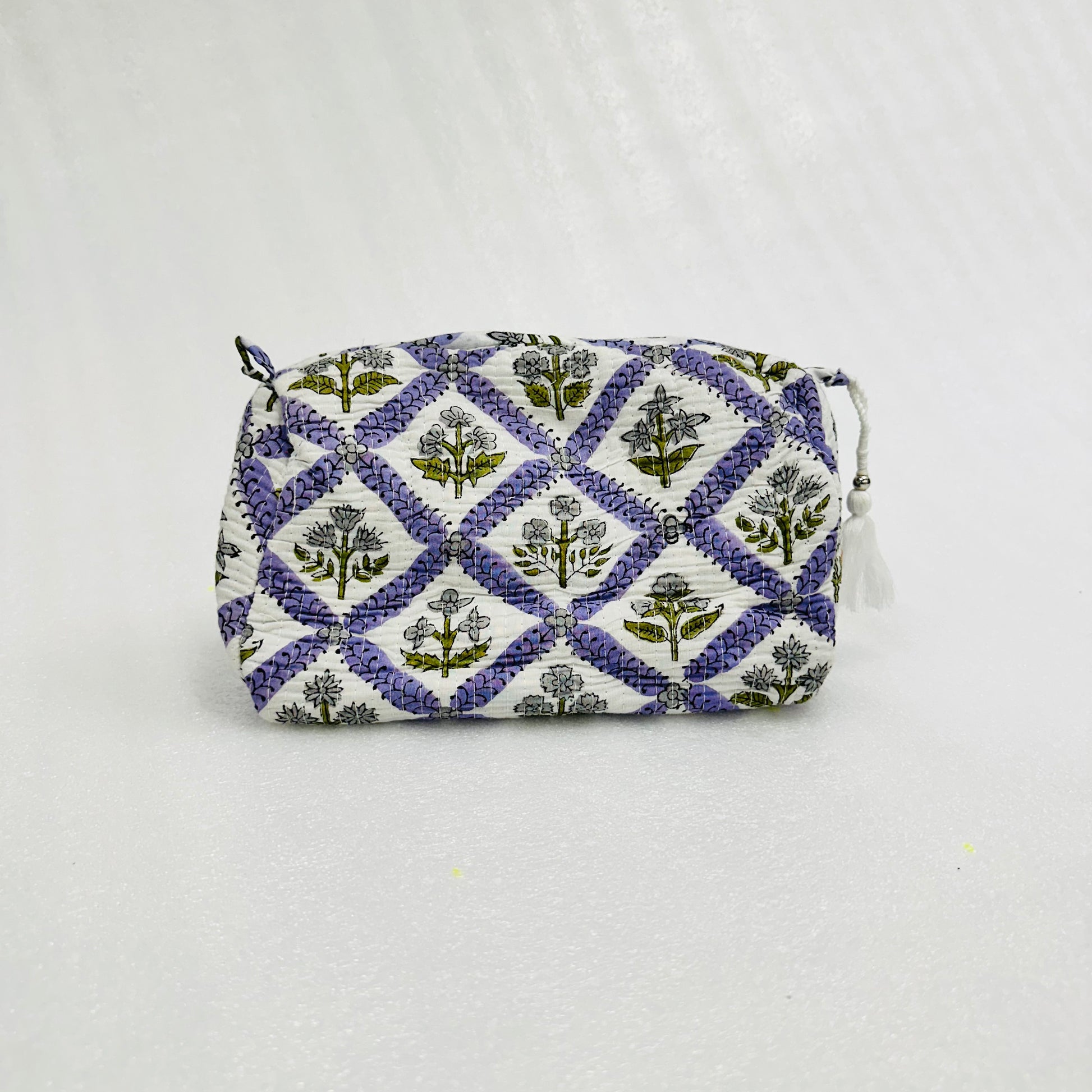 Small pouch with floral pattern on a white background