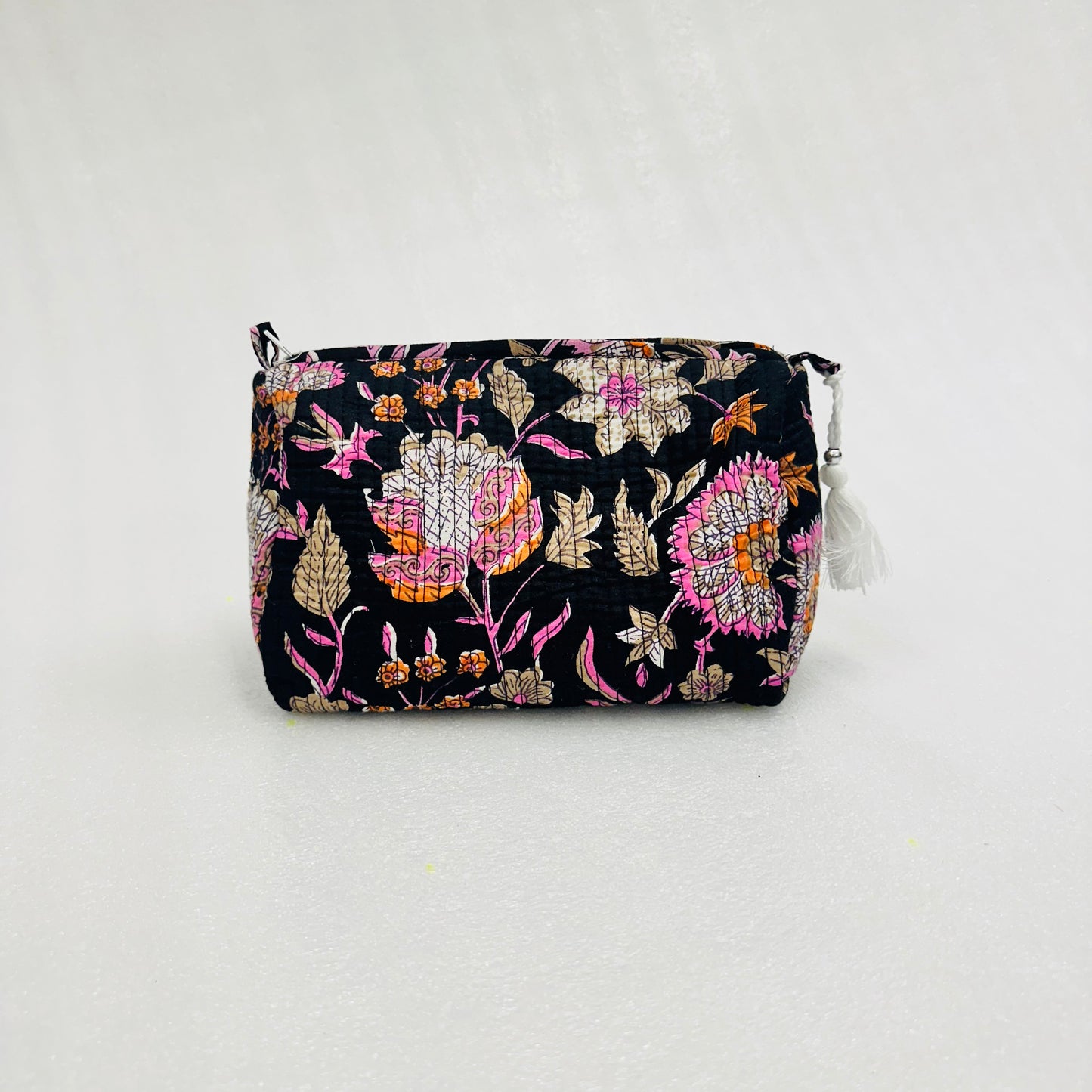 Floral Pink flower patterned pouch on a white background