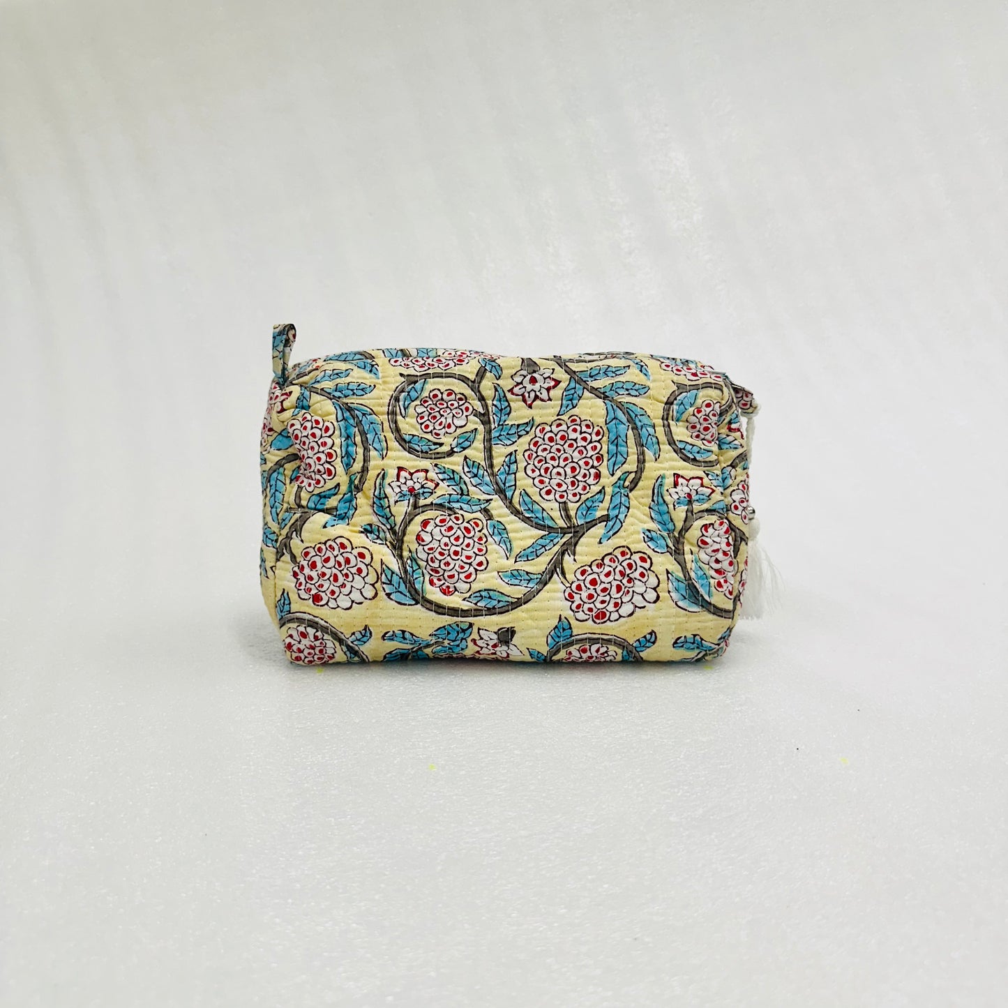 Red & Lime Yellow Floral-patterned pouch on a white background