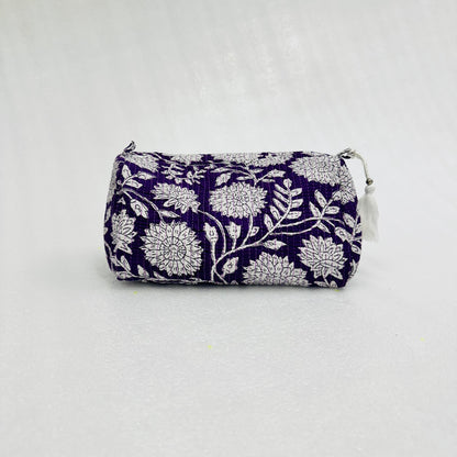 White floral-patterned on a violet  pouch on a white background