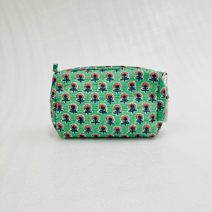 Green patterned pouch on a white background