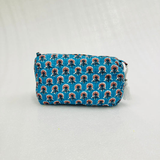 Blue patterned pouch on a white background
